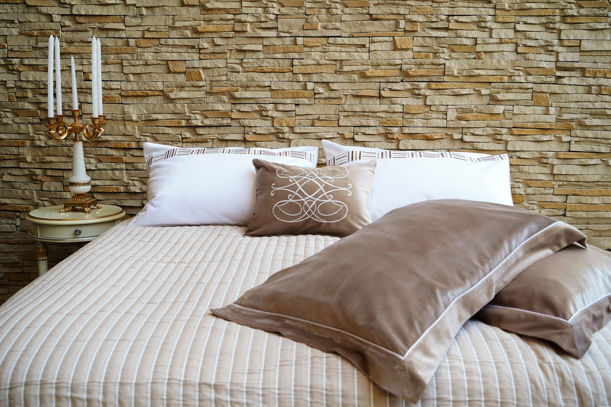 Bedroom bed with pillows and bed sheets